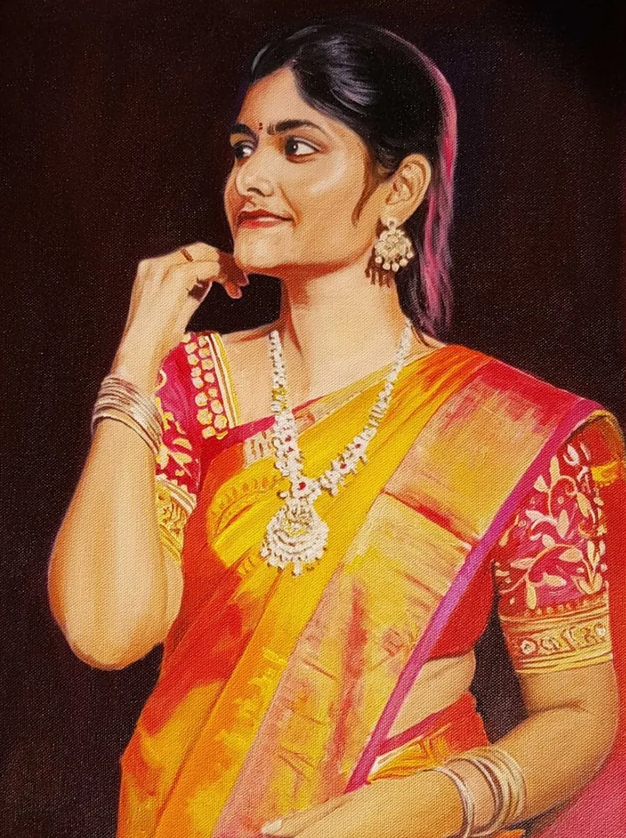 Oil portrait of a young woman in a yellow and red silk sari
