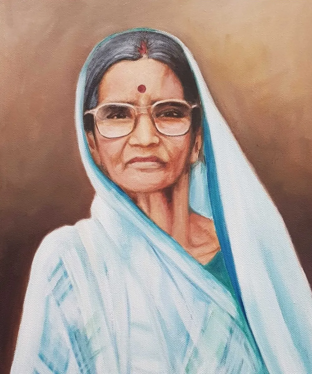 Oil portrait of a lady in a white sari and glasses