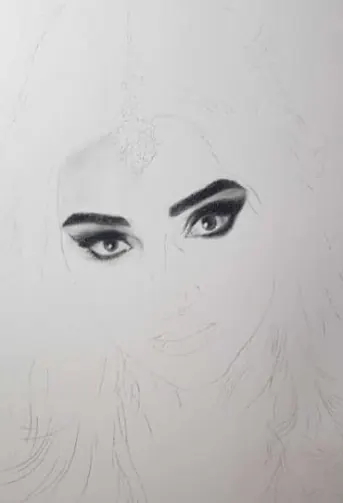 First stage: a light pencil outline with the eyes drawn in